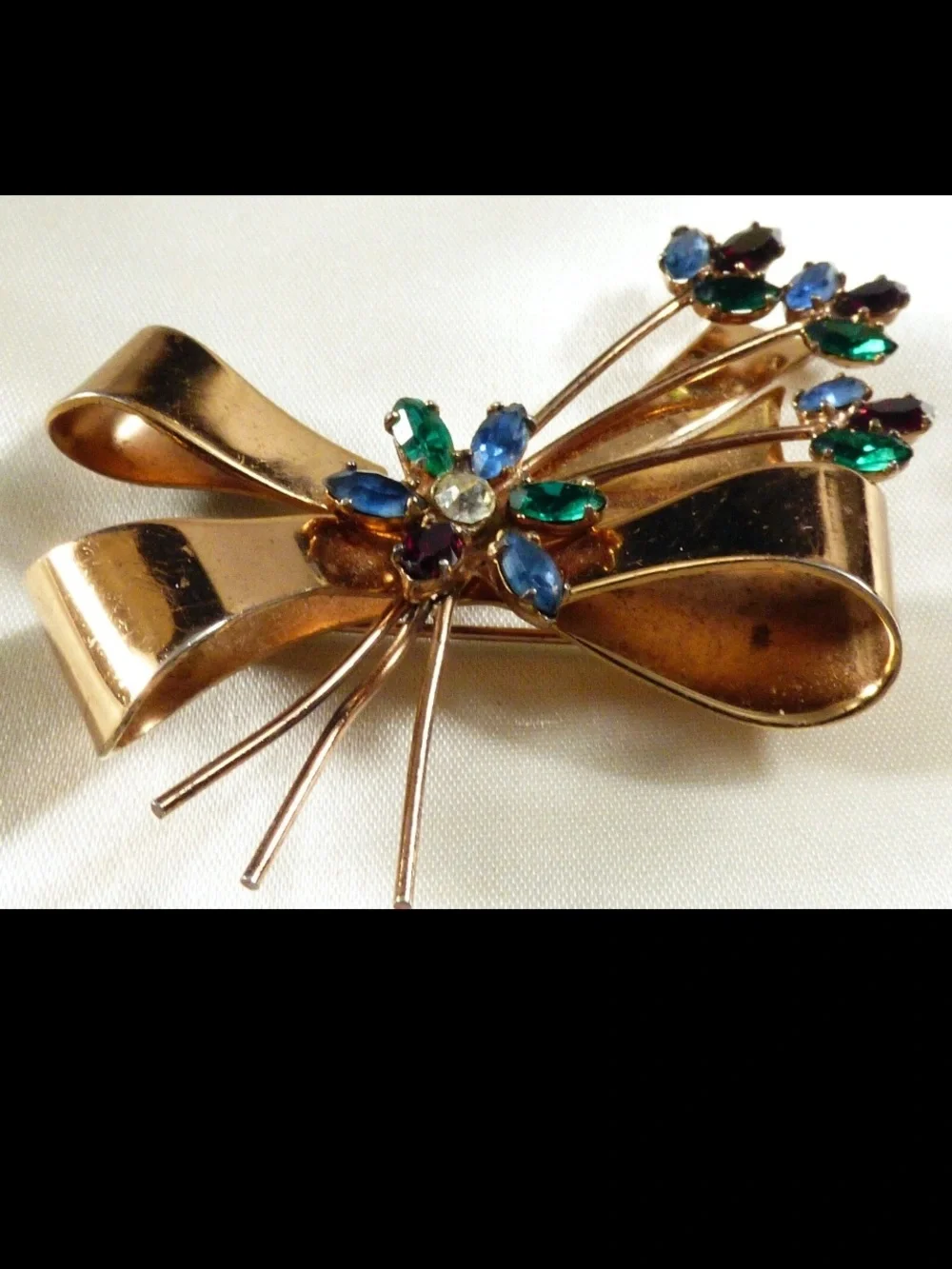 Coro Gold-Tone Bow Brooch with Blue, Green and Clear Stones
